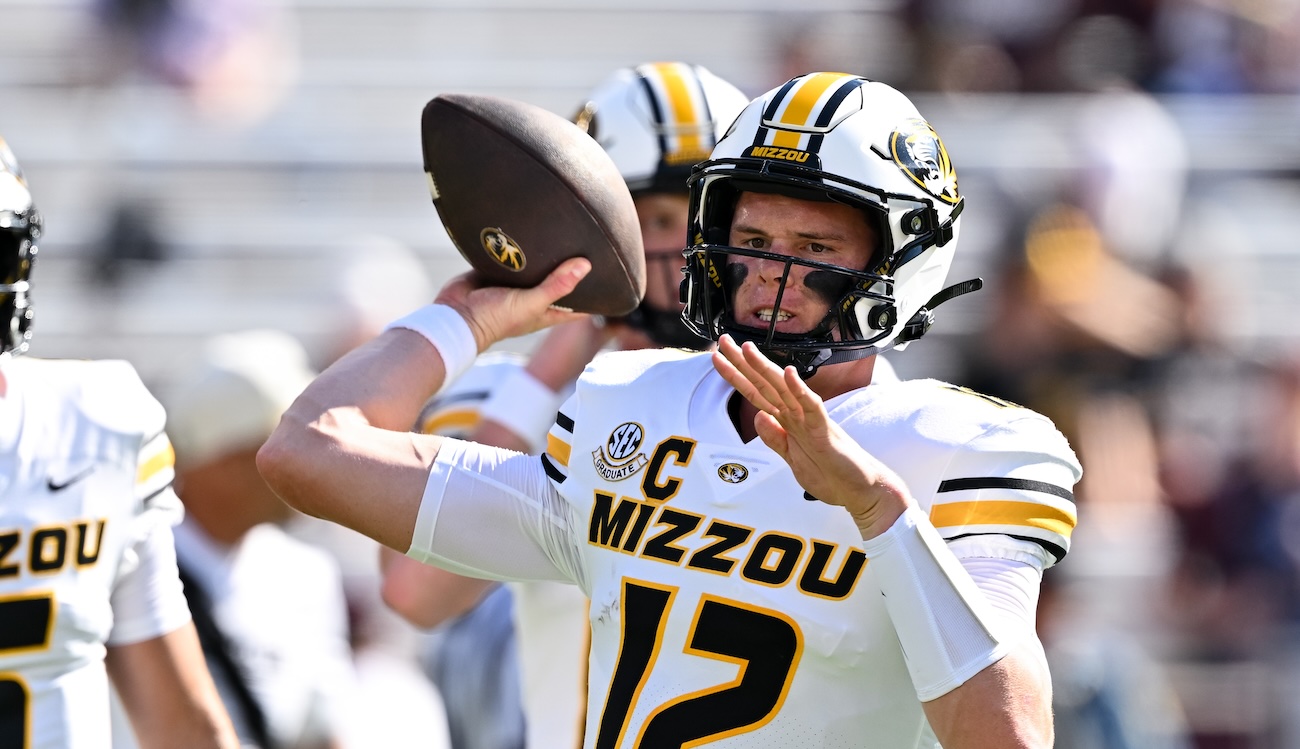 Brady Cook warms up ahead of Mizzou's game at Texas A&M.
